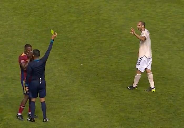 Giorgio Chiellini (right) pictured receiving the first yellow card of his MLS career during LAFC's 4-1 win at Real Salt Lake in August 2022